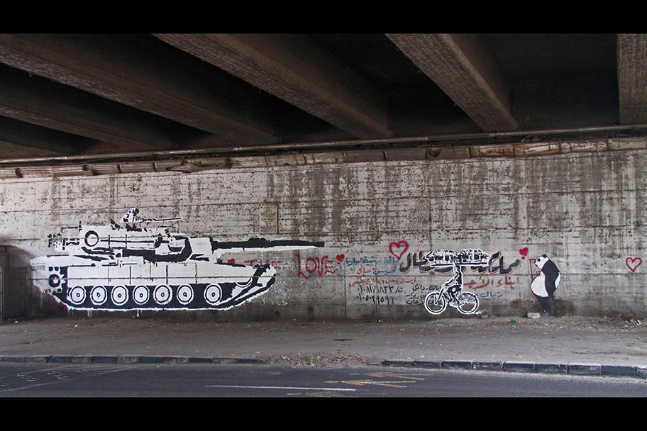 CounterCurrent19 - Ganzeer, Tank vs. Bread-Man, 2011. Paint on Wall. Photo: Mehri Khalil. Courtesy the artist.